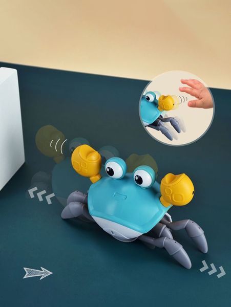 Інтерактивні іграшки - Музична іграшка Краб на батарейках інтерактивний зі звуковими ефектами Блакитний