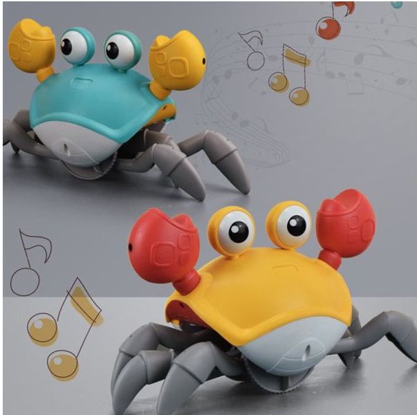 Інтерактивні іграшки - Музична іграшка Краб на батарейках інтерактивний зі звуковими ефектами Помаранчевий