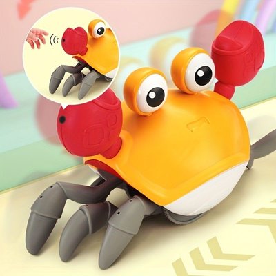 Інтерактивні іграшки - Музична іграшка Краб на батарейках інтерактивний зі звуковими ефектами Помаранчевий